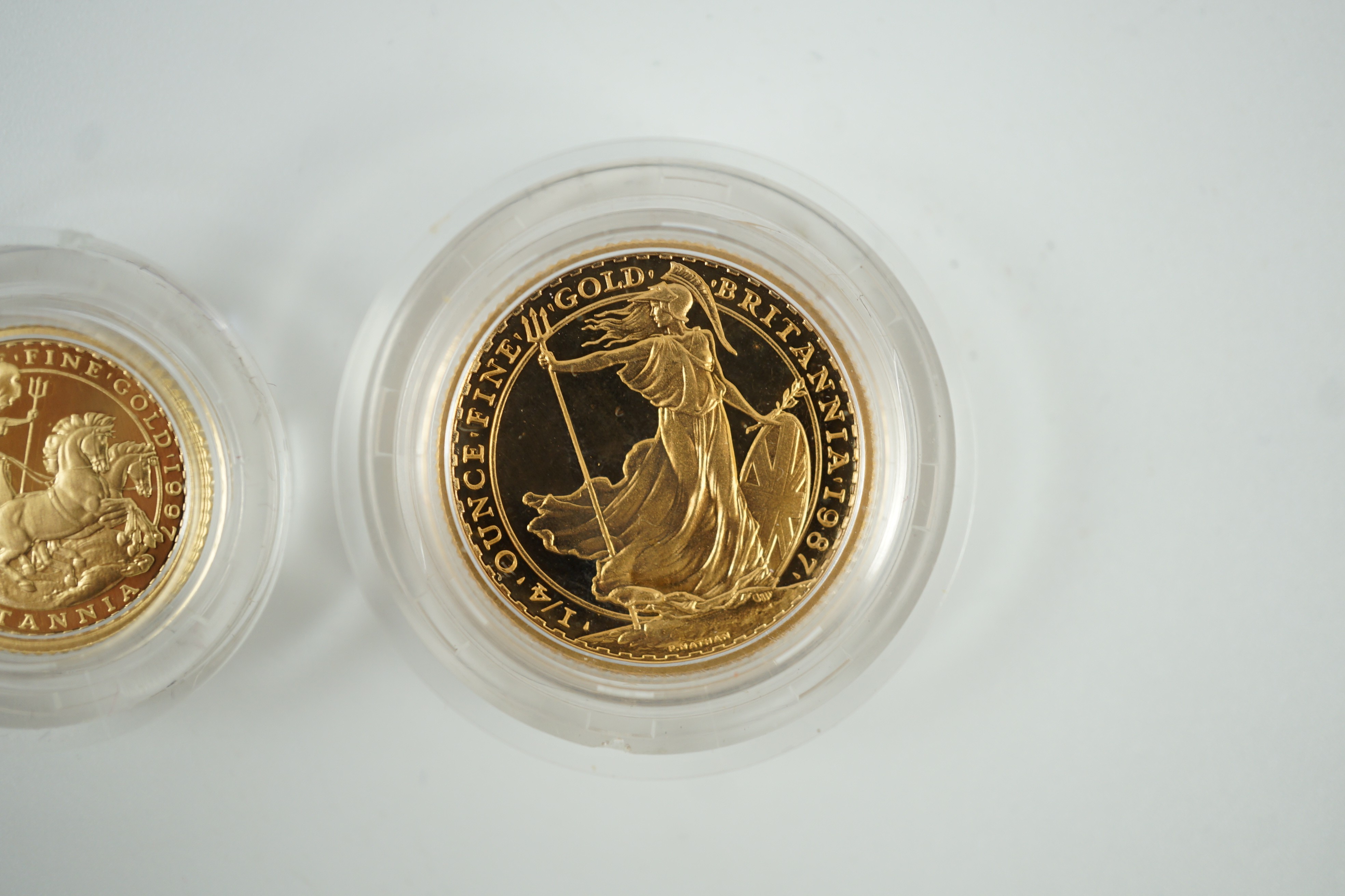 Elizabeth II (1952-2022), Royal mint gold proof Britannia £10, 1997 and gold proof Britannia quarter oz. £25, 1987, both cased